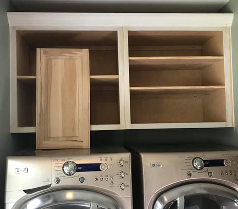 Cabinet with crown molding and door